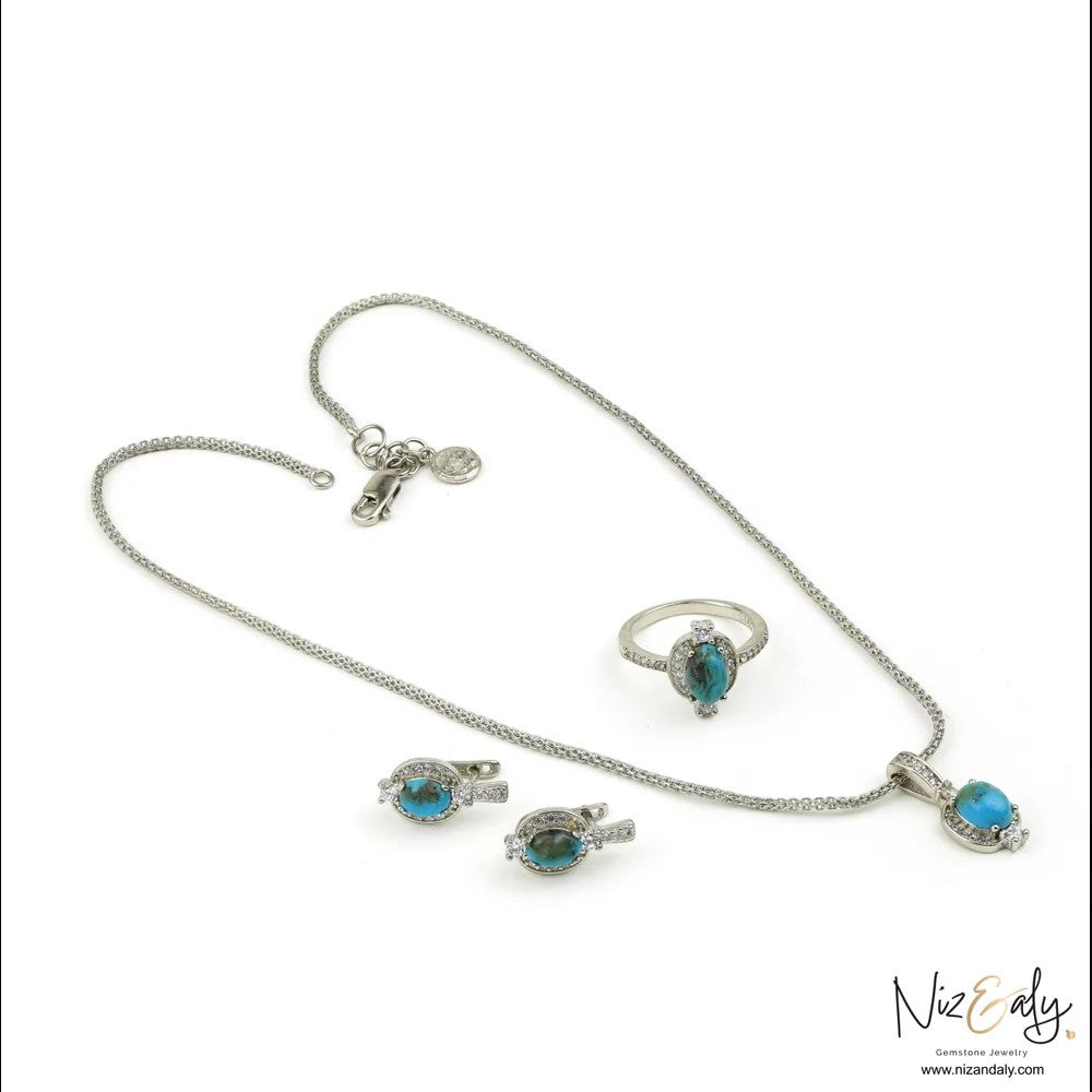 Niz & Aly oval Kingman blue turquoise pendant, ring, and earring set in 925 sterling silver with accent stones.