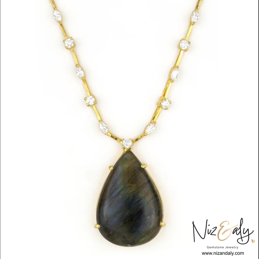 Niz & Aly teardrop labradorite pendant necklace with a gold-toned studded chain featuring clear accent stones.