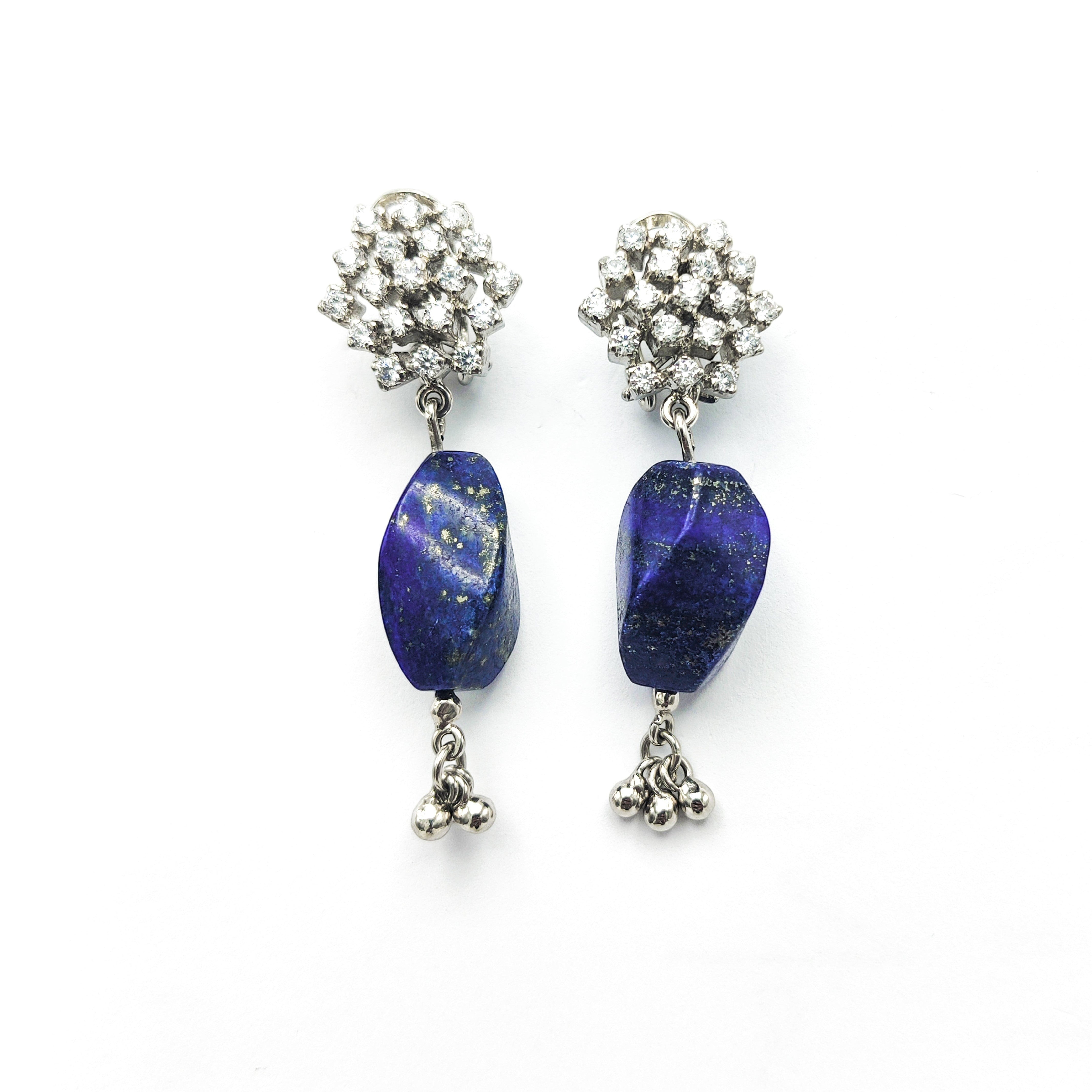 Niz & Aly drop earrings featuring deep blue lapis lazuli stones with sparkling crystal clusters and silver accents
