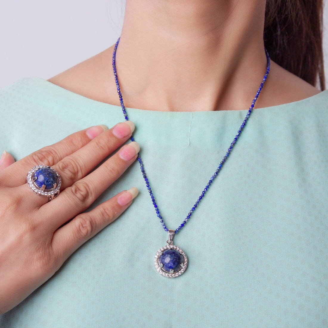 Niz & Aly Celestial Blue Lapis Set featuring a beaded necklace with a round lapis pendant and matching gemstone ring.