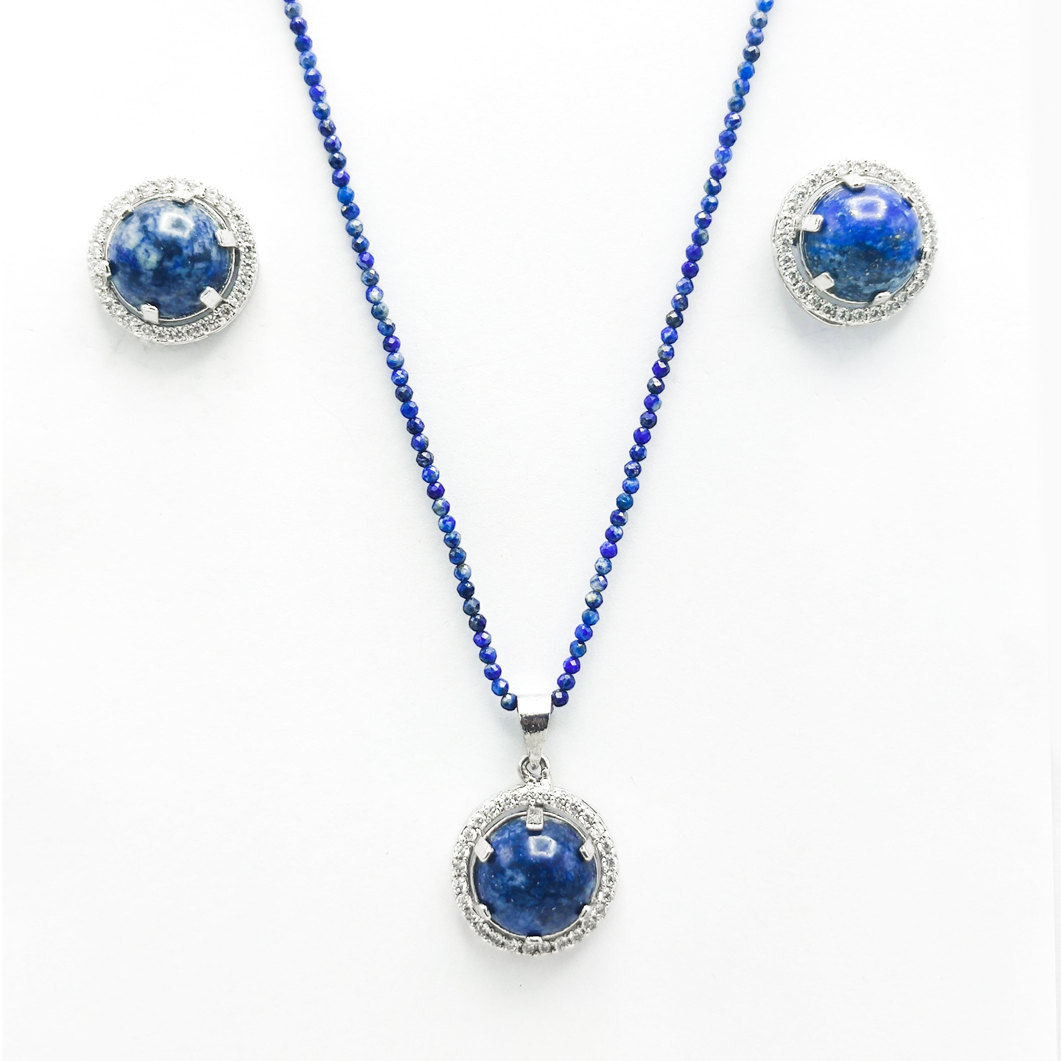 Niz & Aly Celestial Blue Lapis Set featuring a beaded necklace and matching stud earrings with gold-flecked gemstones.