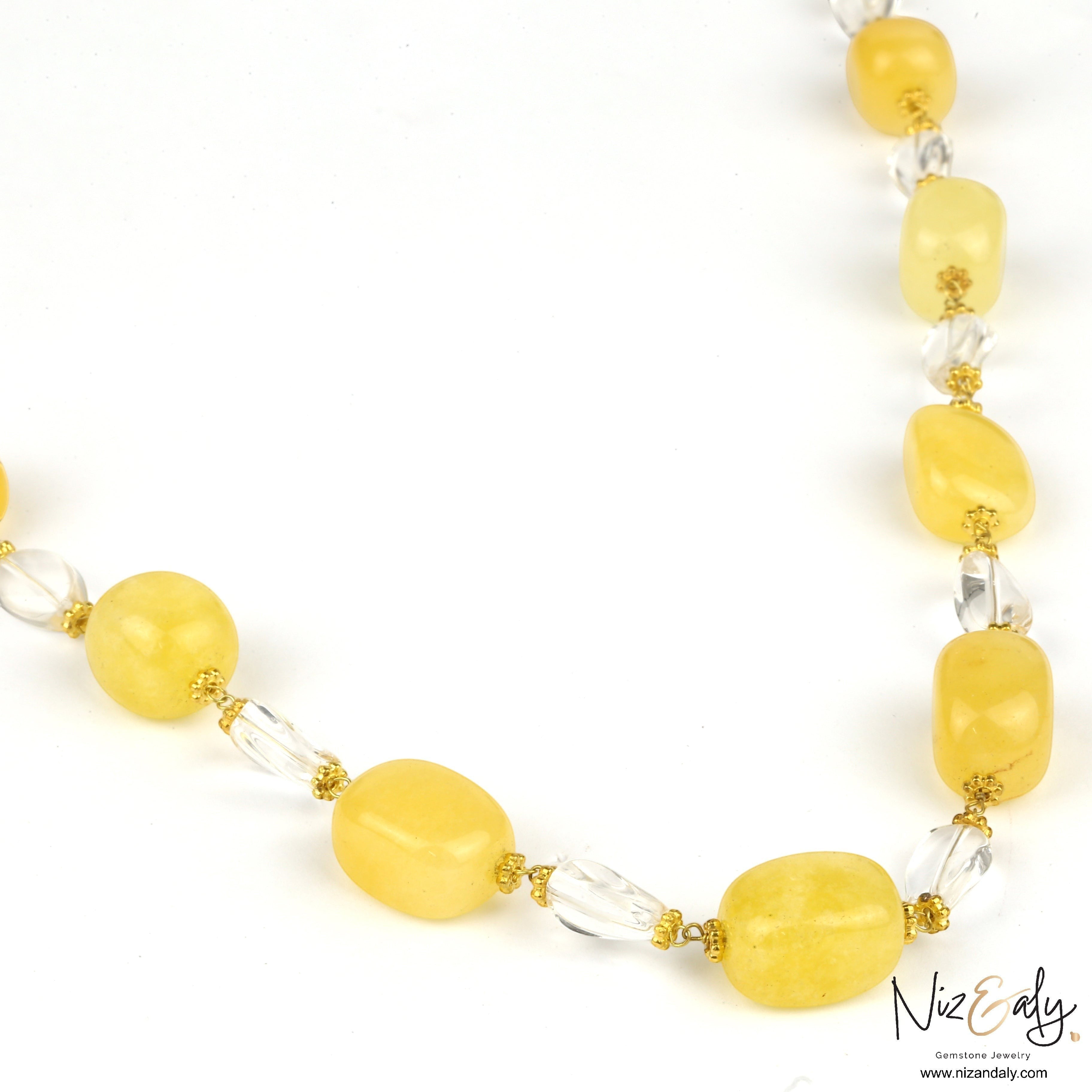 Niz & Aly handcrafted necklace featuring lemon chiffon jade and clear icy quartz beads on a gold-toned wire strand.