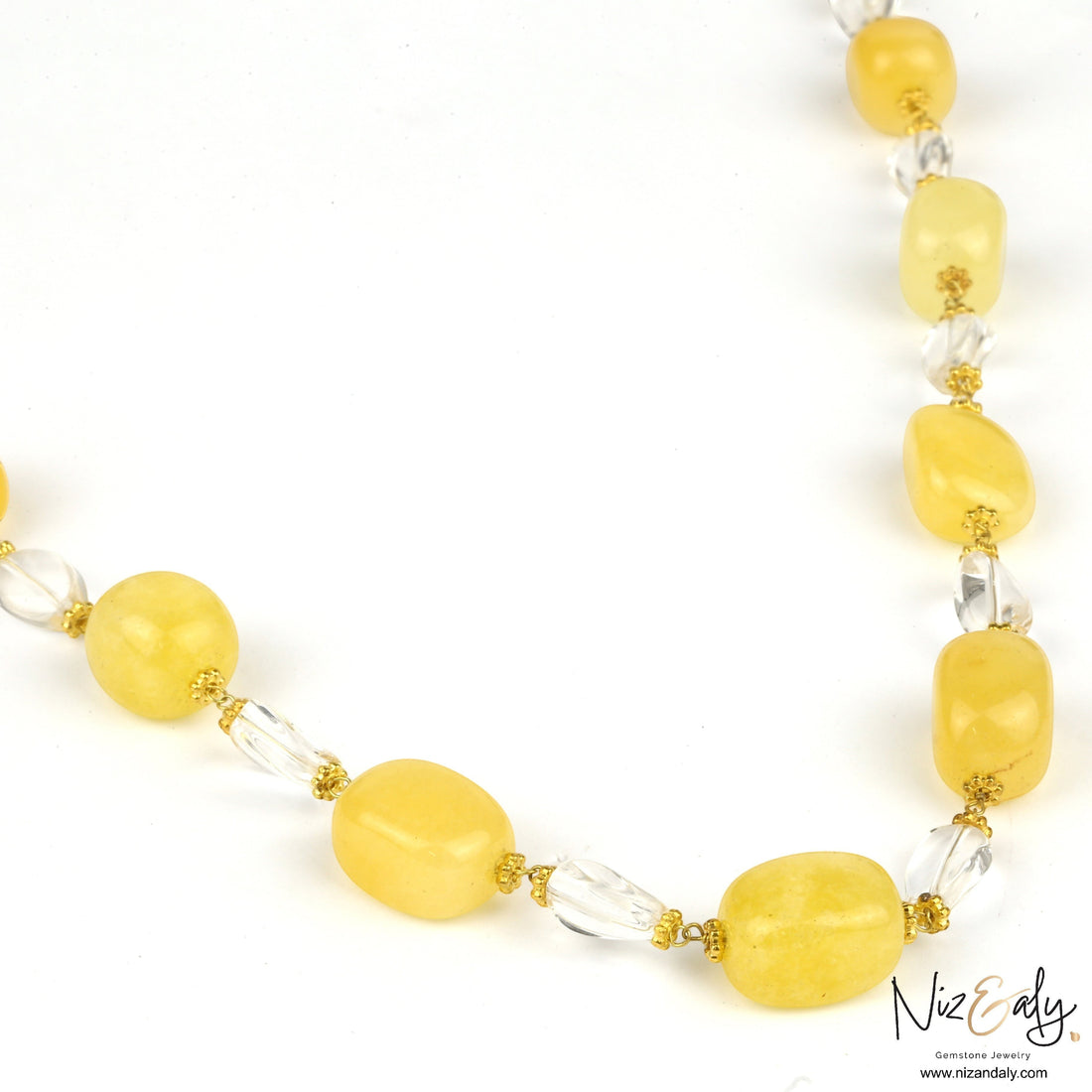 Niz & Aly handcrafted necklace featuring lemon chiffon jade and clear icy quartz beads on a gold-toned wire strand.