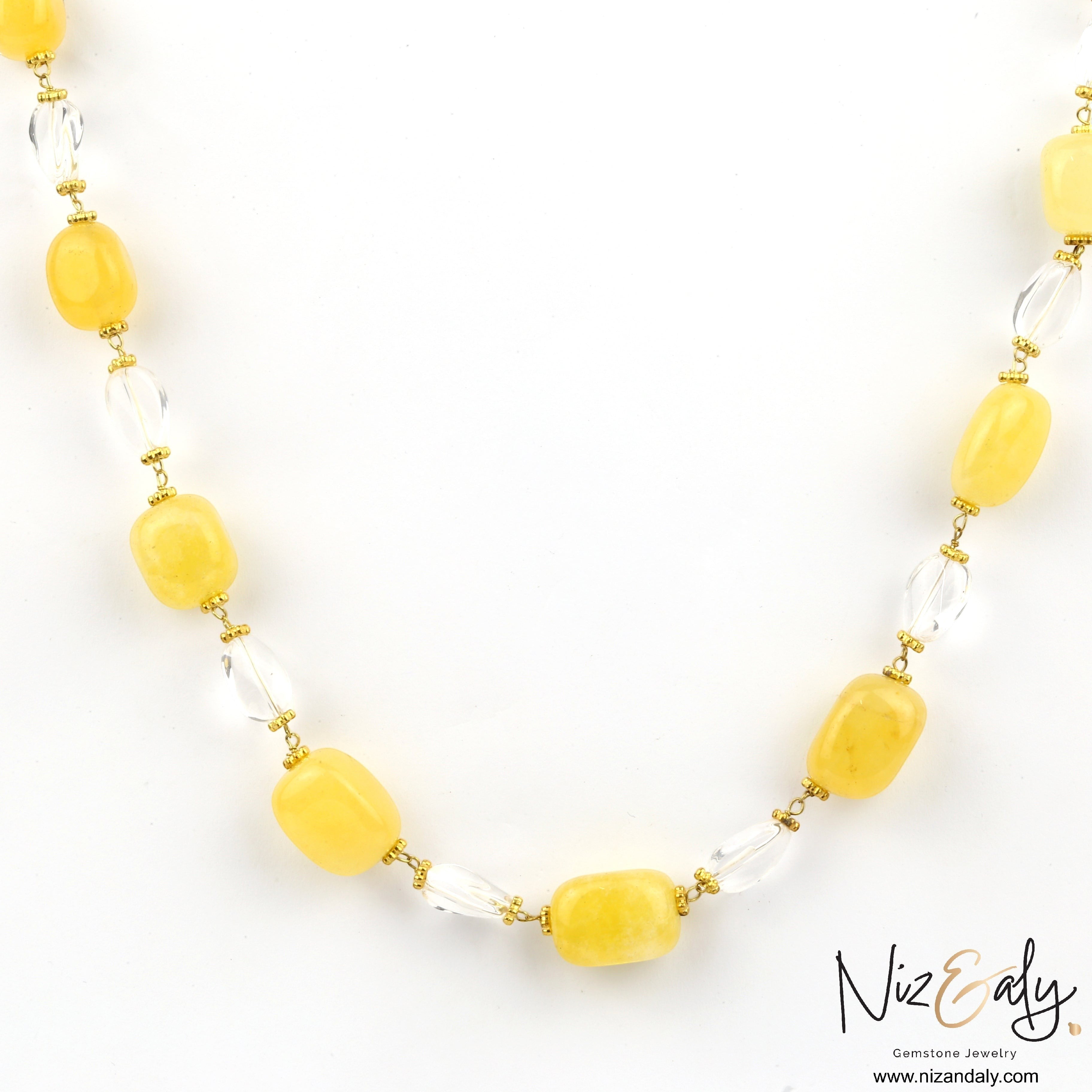 Niz & Aly handcrafted necklace featuring lemon chiffon jade and clear icy quartz beads on a delicate gold chain.