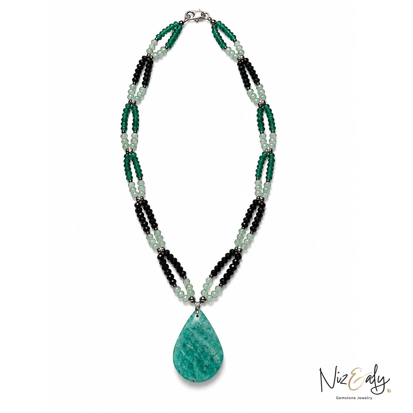 Niz & Aly multi-strand gemstone necklace featuring green and black beads with a large teardrop pendant