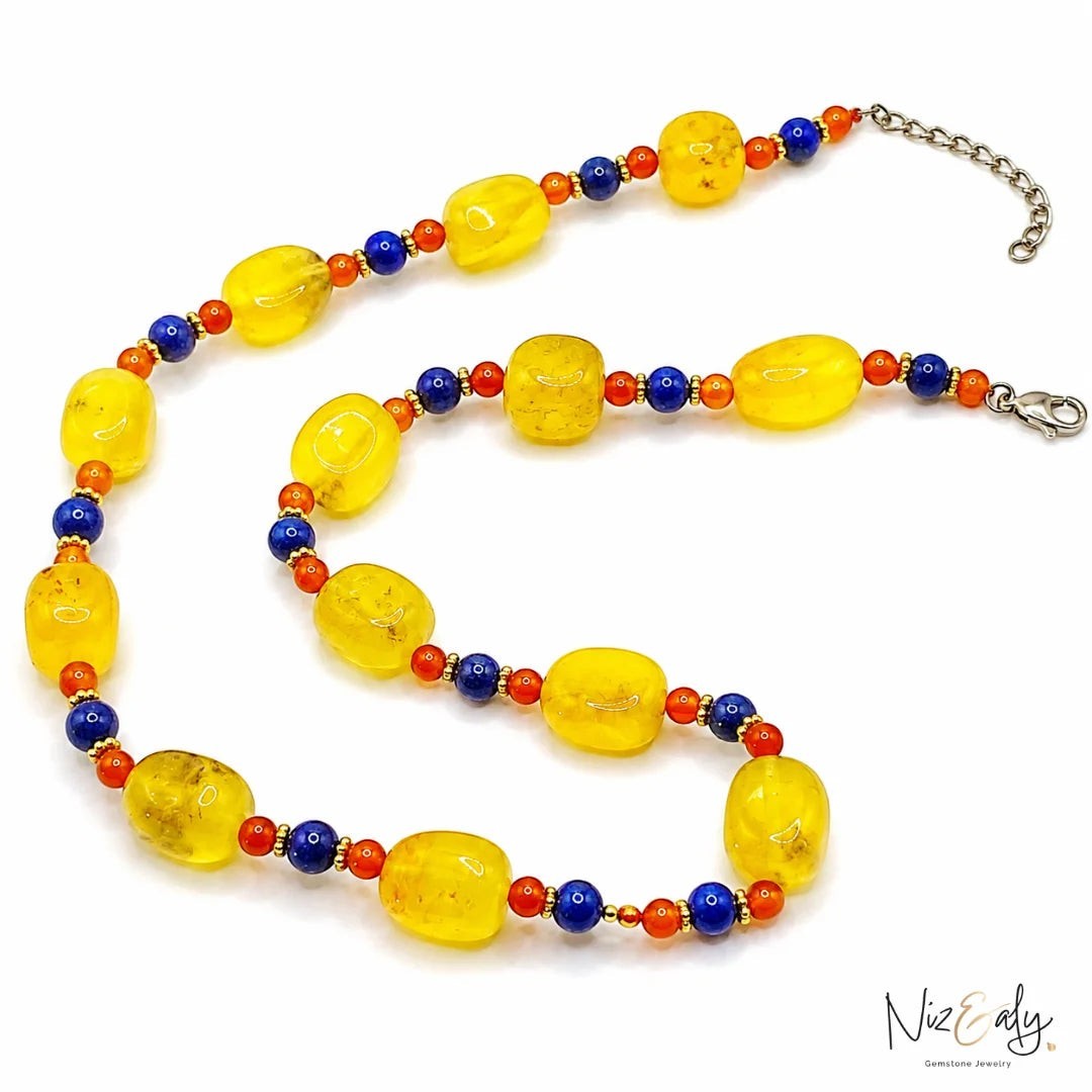 Niz & Aly multicolor beaded necklace featuring yellow agate, orange carnelian, and blue lapis lazuli gemstones.