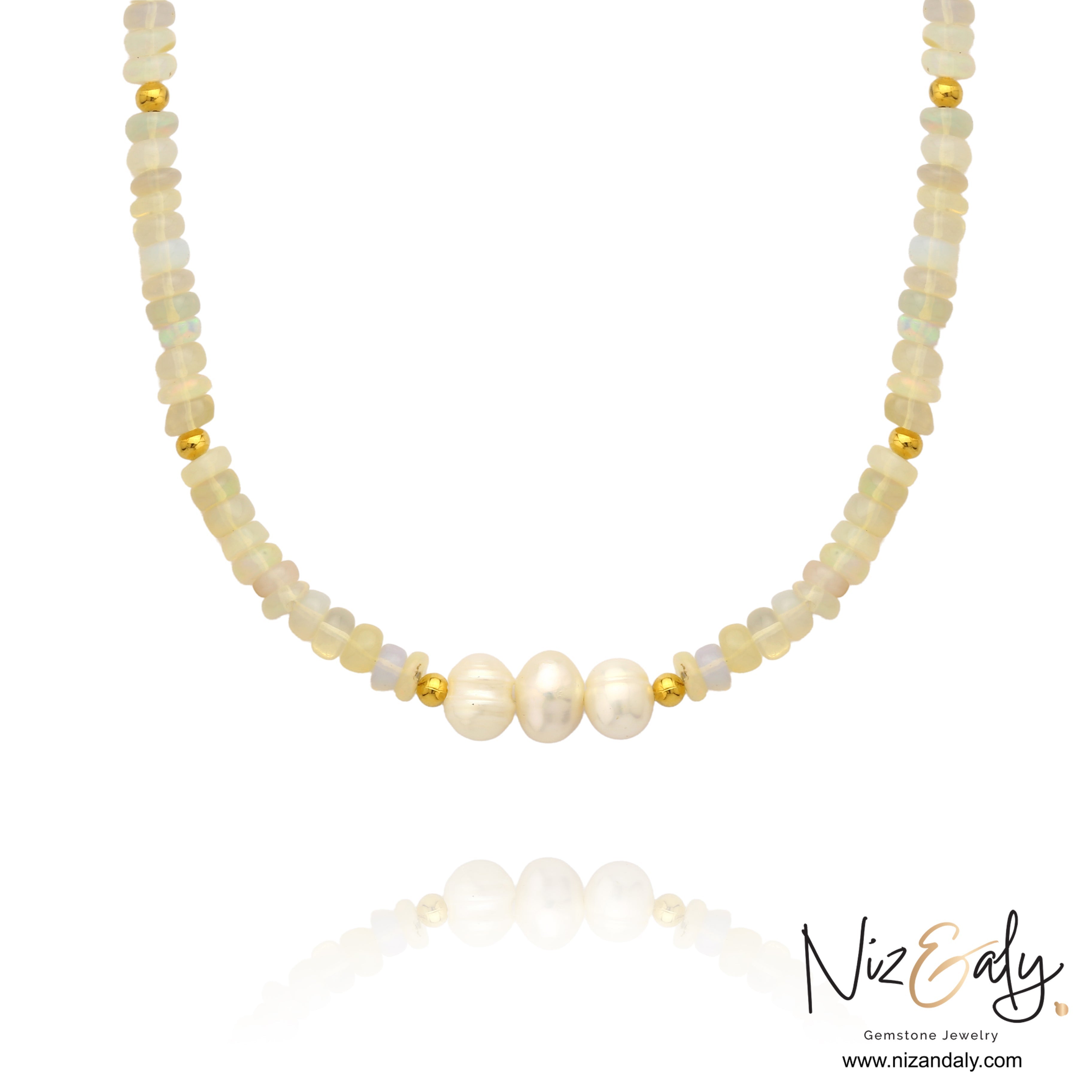Niz & Aly Lunar Grace necklace featuring Ethiopian opal beads, three freshwater pearls, and gold spacers.