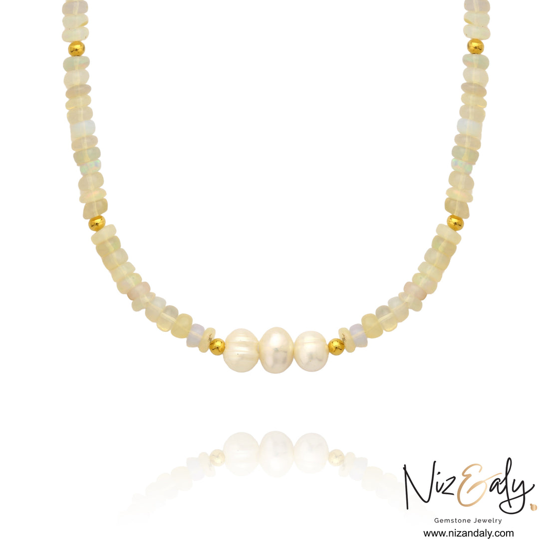 Niz & Aly Lunar Grace necklace featuring Ethiopian opal beads, three freshwater pearls, and gold spacers.