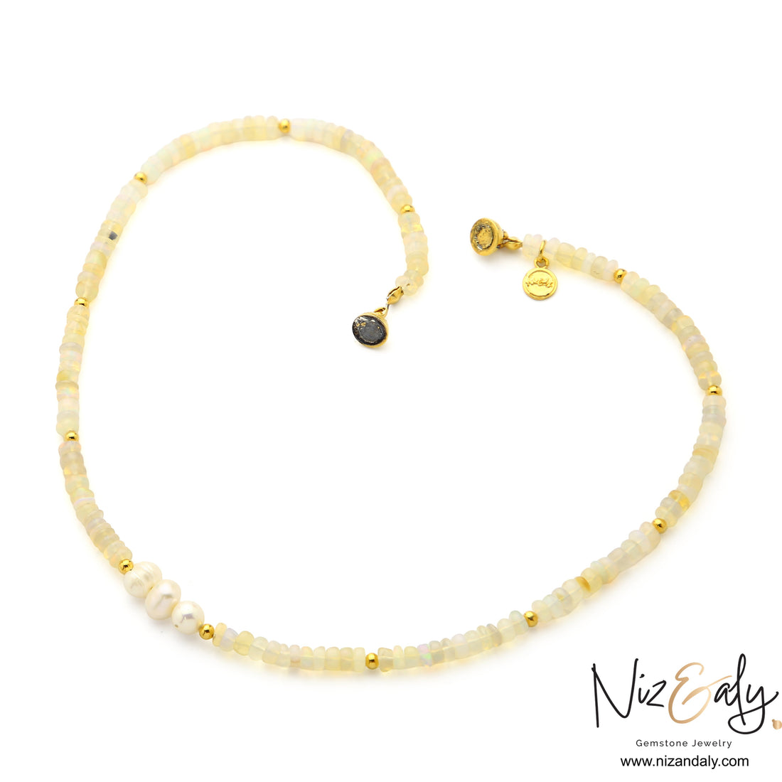 Niz & Aly Lunar Grace necklace featuring Ethiopian opal beads, three freshwater pearls, and gold spacers.