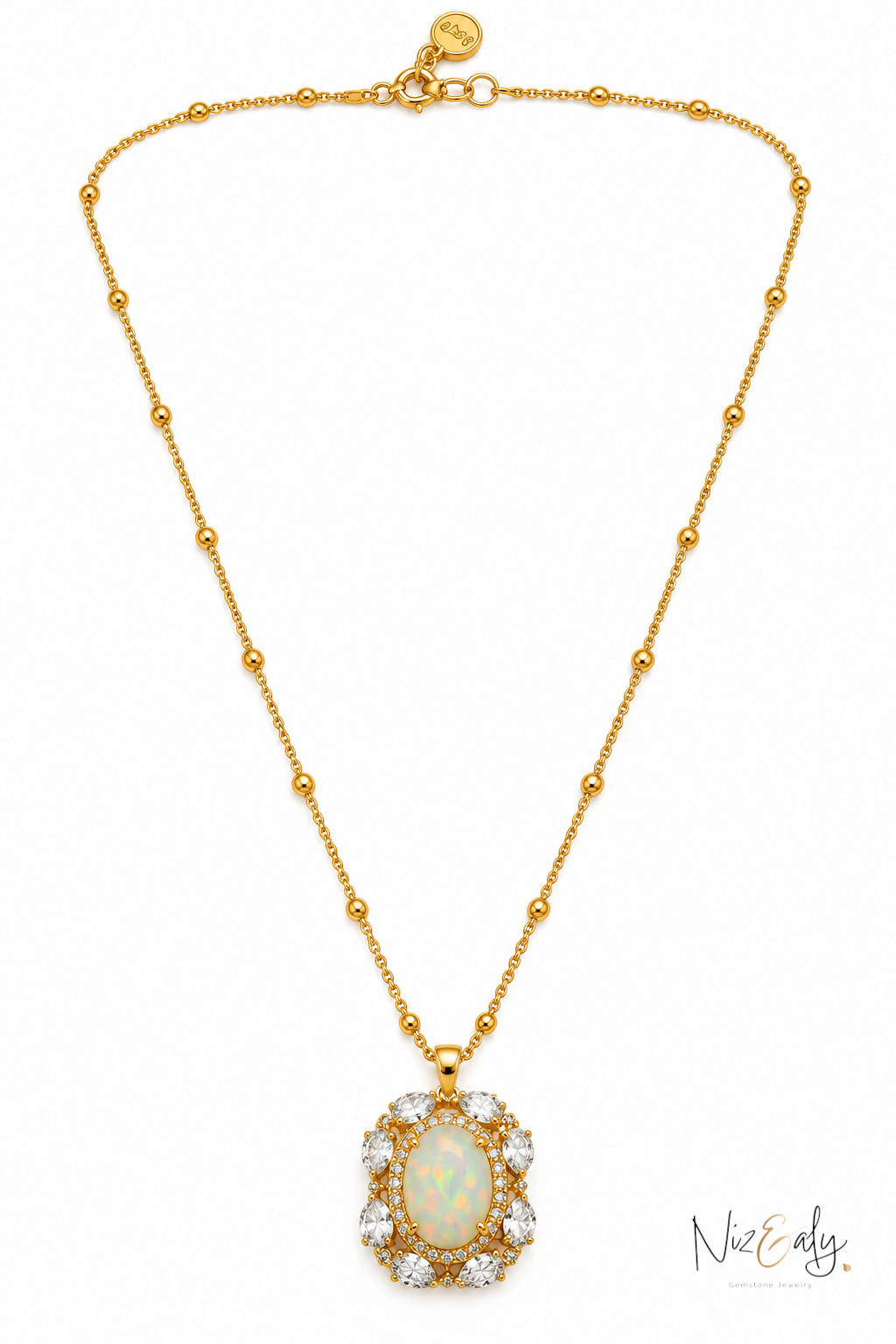 Niz & Aly gold beaded chain necklace featuring a central oval opal surrounded by clear quartz stones