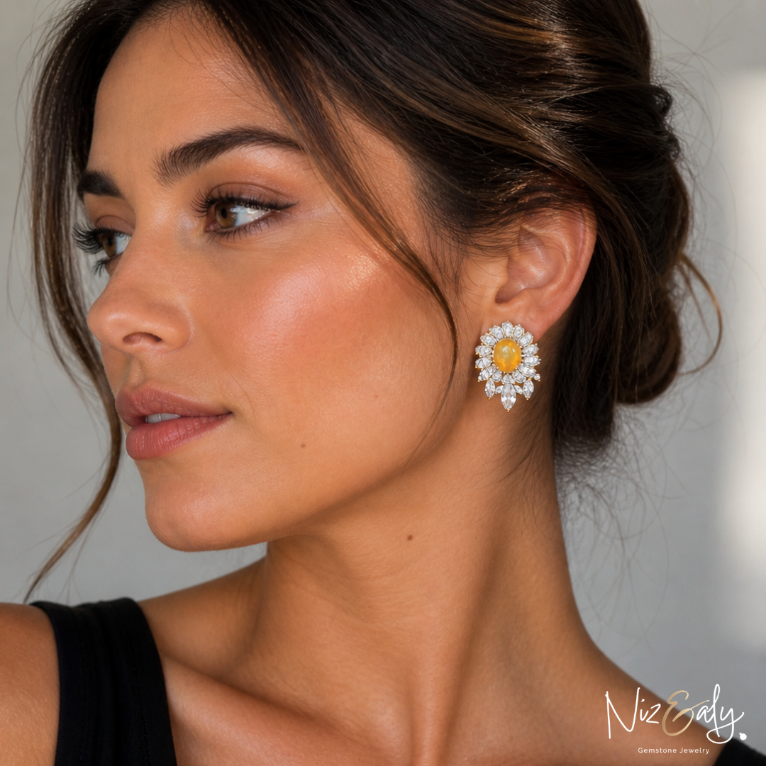 Niz & Aly natural opal and clear quartz floral stud earrings worn by a woman with an elegant updo hairstyle.