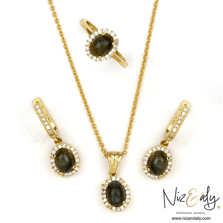 Niz & Aly dainty oval fire labradorite pendant, earrings, and ring set in gold-plated 925 silver with halo crystals.