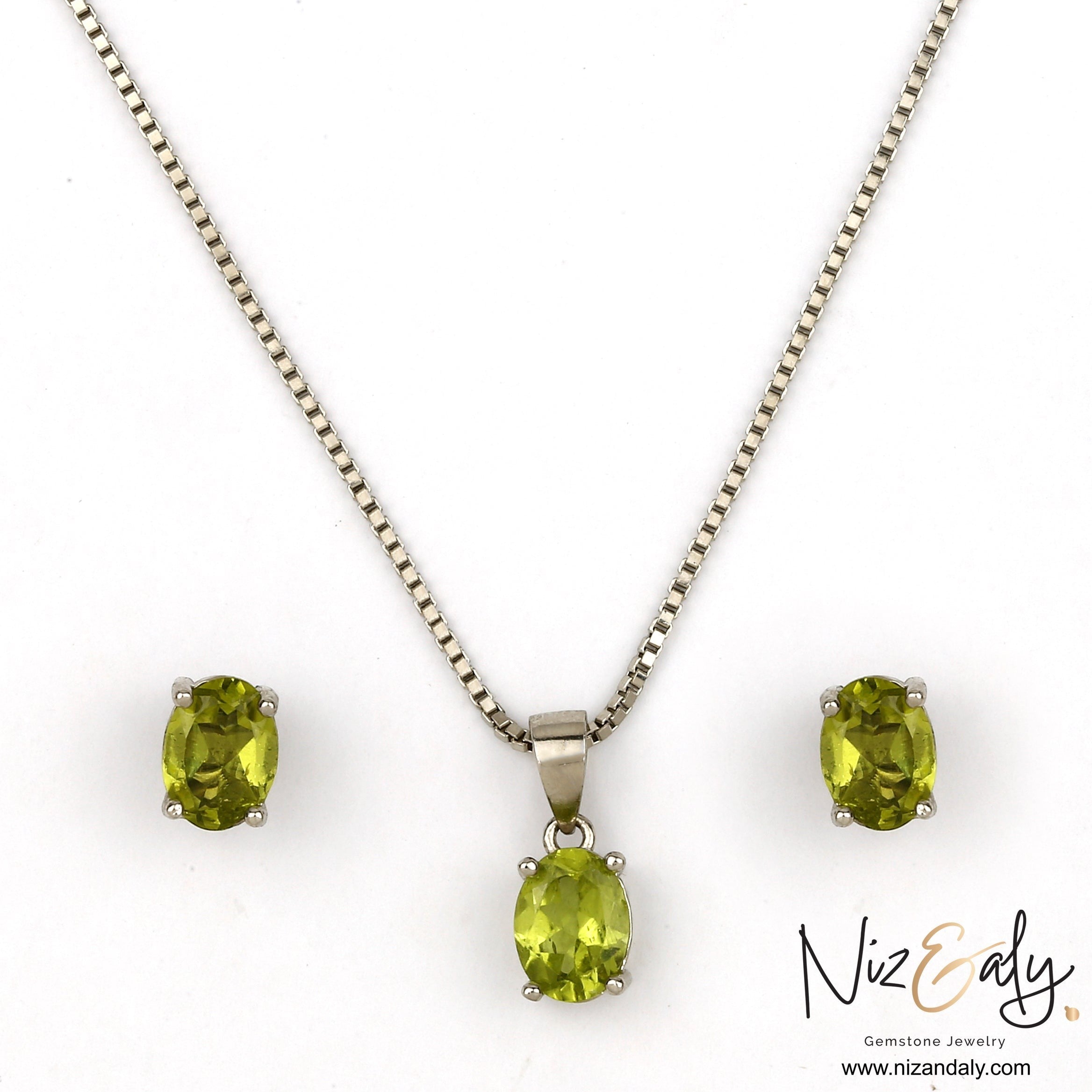 Niz & Aly oval peridot solitaire pendant and matching stud earrings set in silver