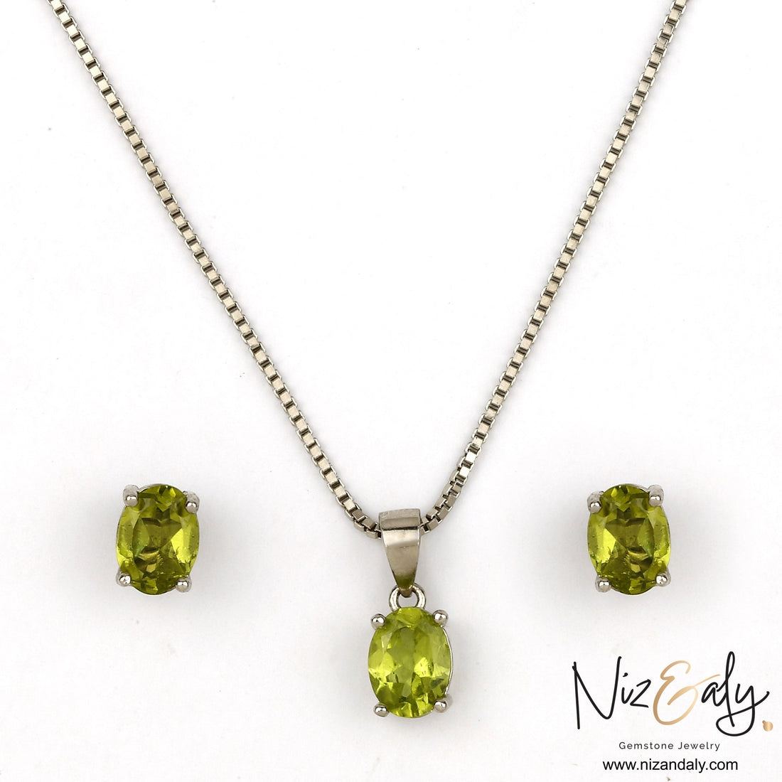 Niz & Aly oval peridot solitaire pendant and matching stud earrings set in silver