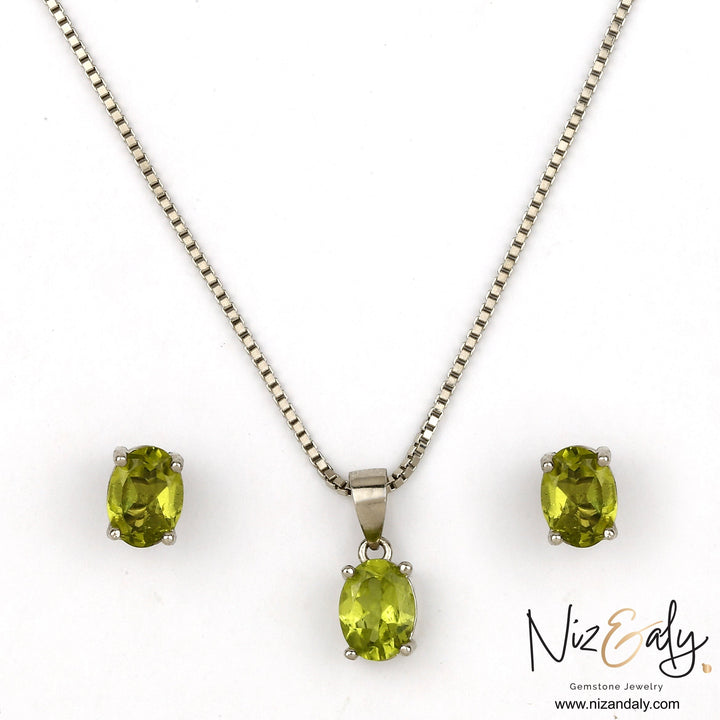 Niz & Aly oval peridot solitaire pendant and matching stud earrings set in silver