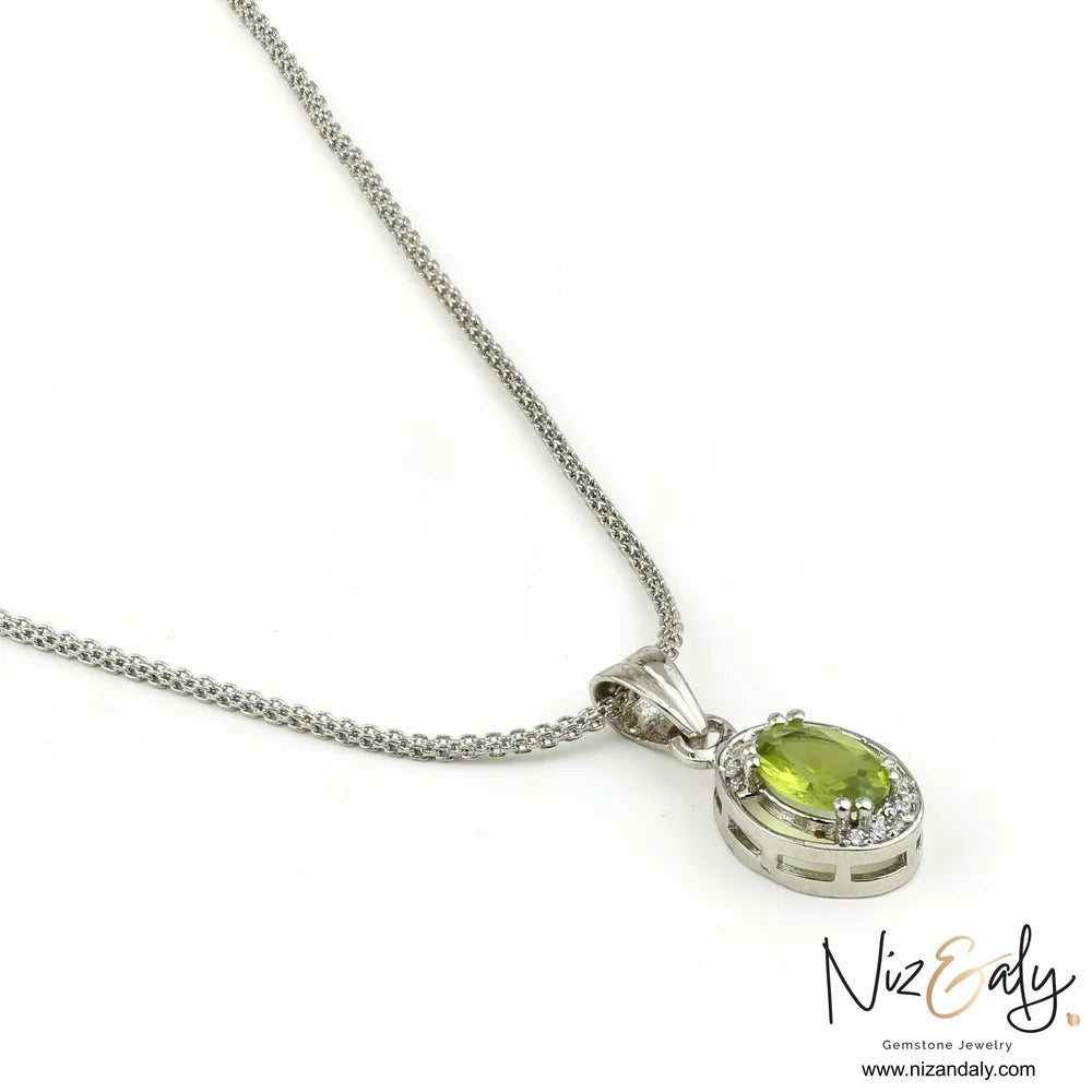 Niz & Aly Sage Dawn oval Arizona peridot pendant necklace in silver with accent stones on a delicate chain