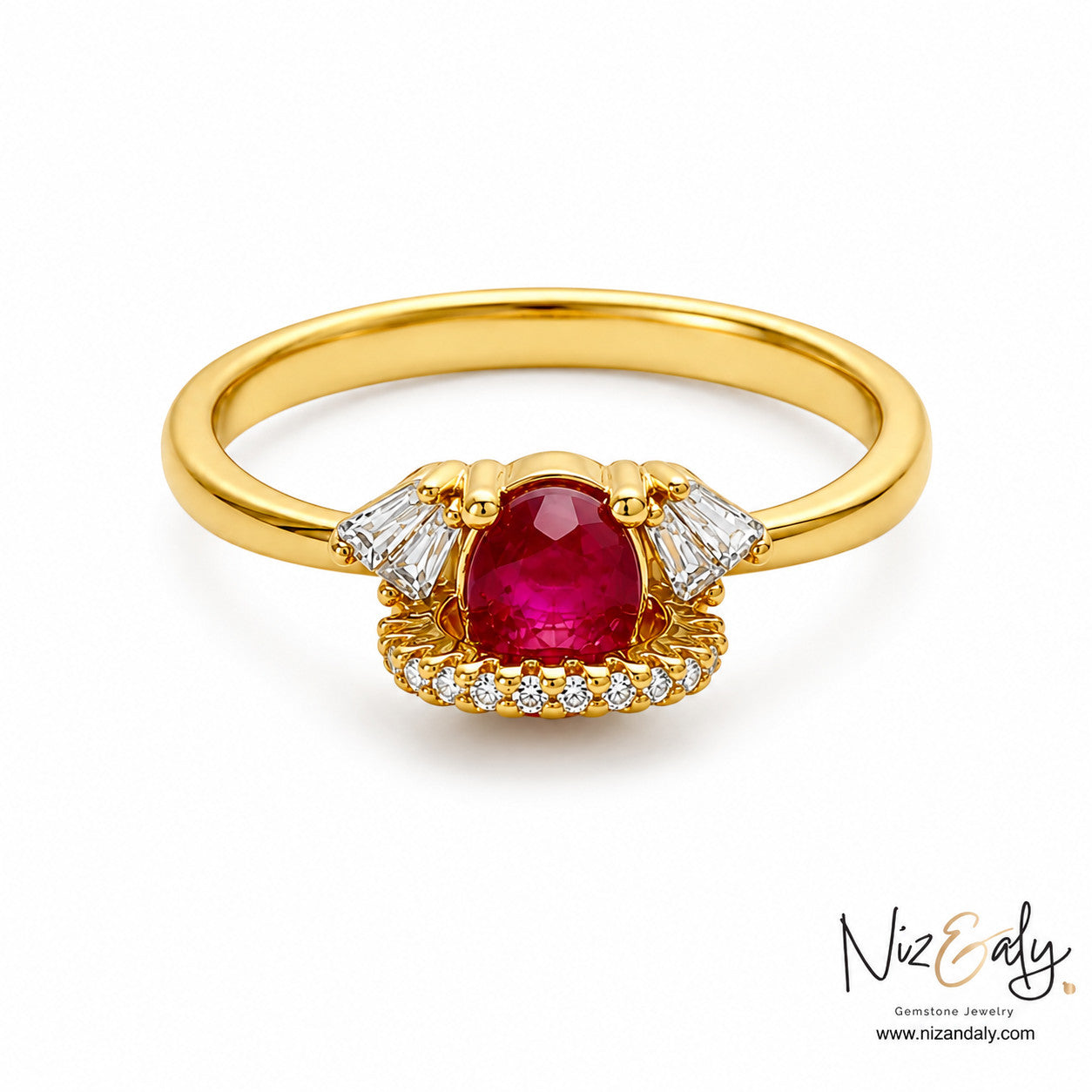 Niz & Aly oval ruby ring in 18k gold with baguette and pavé diamond accents on a white background.