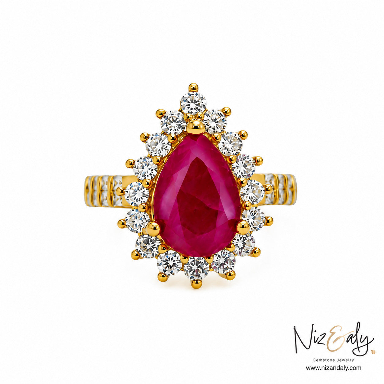 Niz & Aly pear-cut natural ruby ring with a diamond halo set in polished yellow gold