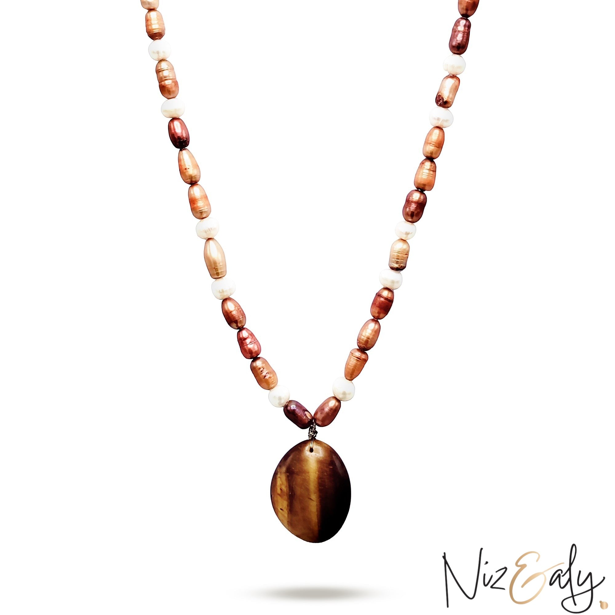 Niz & Aly freshwater pearl necklace featuring a polished oval tiger eye gemstone pendant in brown and white tones.