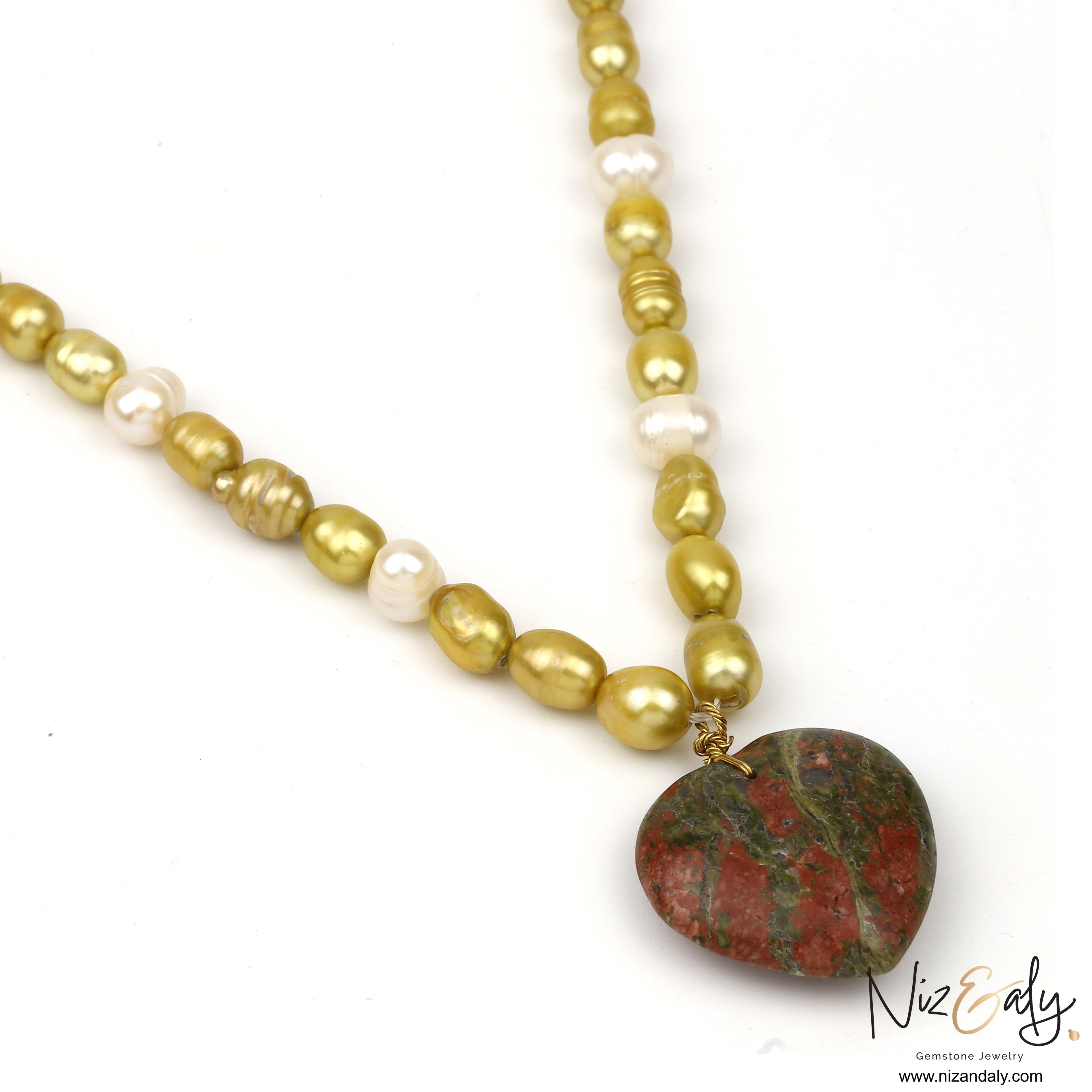 Niz & Aly golden and white cultured pearl necklace featuring a natural  shade of green and brown unakite jasper heart pendant.
