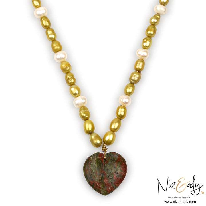 Niz & Aly cultured pearl necklace featuring a natural shade of green and brown unakite jasper heart  pendant on a gold wire wrap.