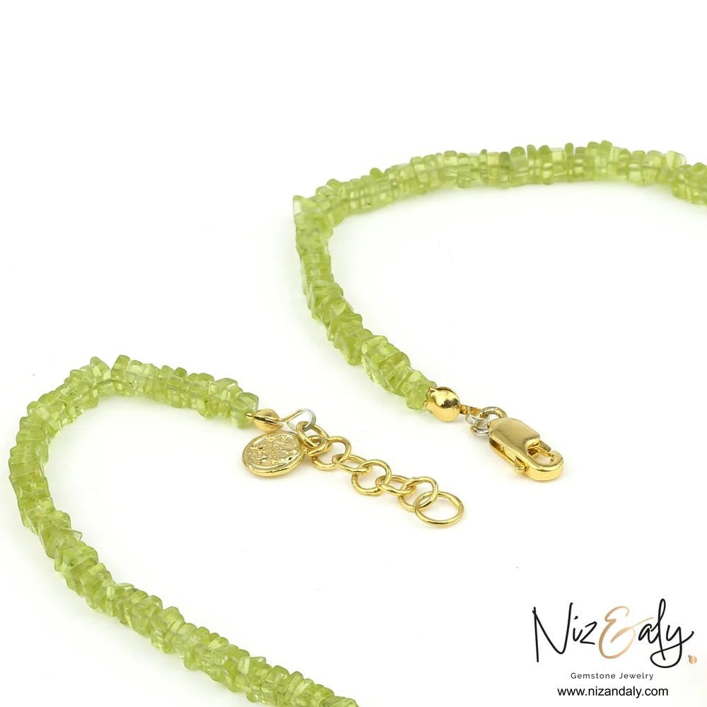 Niz & Aly candy-beaded necklace featuring vibrant green Arizona peridot stones with gold-plated sterling silver clasp.