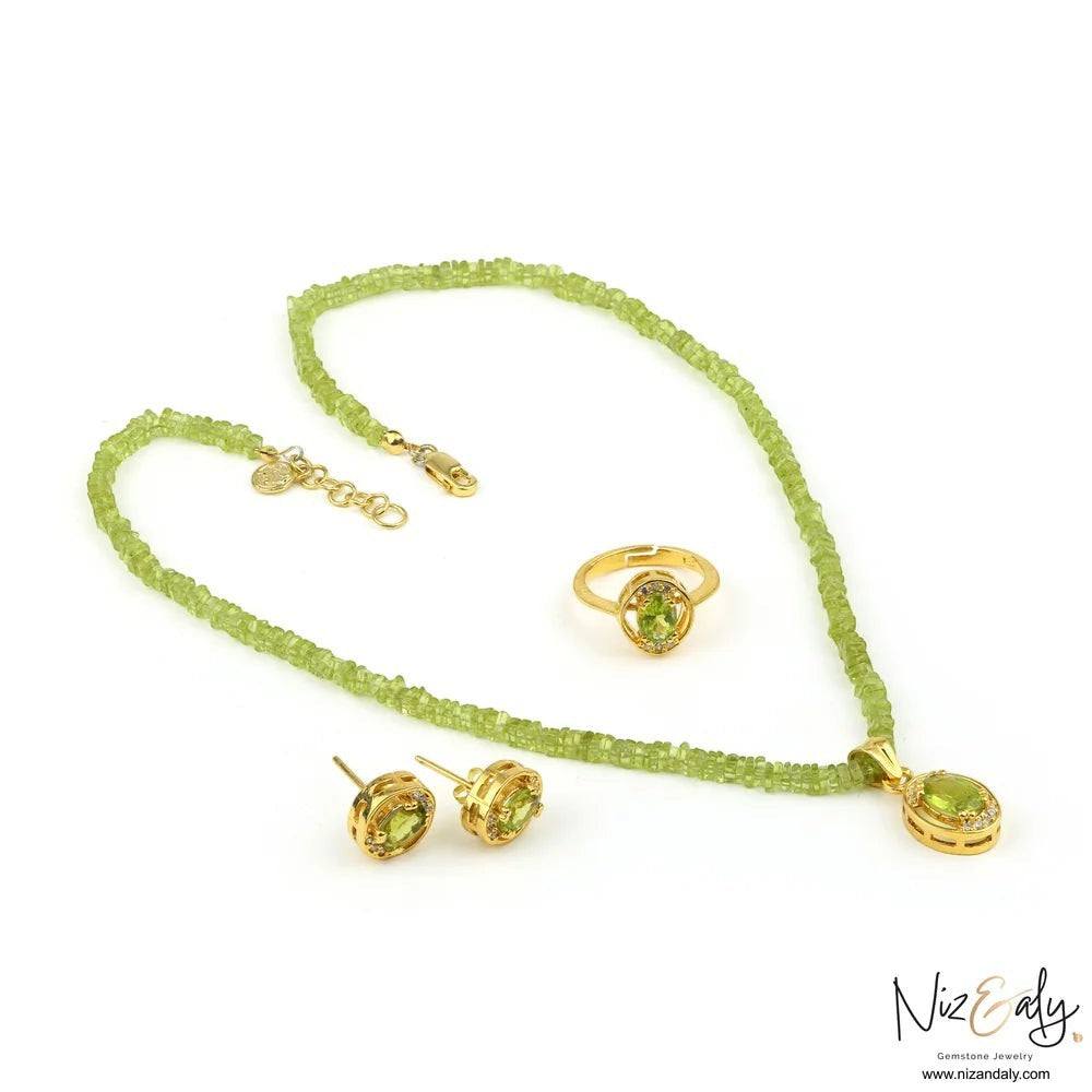 Niz & Aly oval Arizona peridot pendant set with beaded necklace, stud earrings, and ring in gold-plated sterling silver.