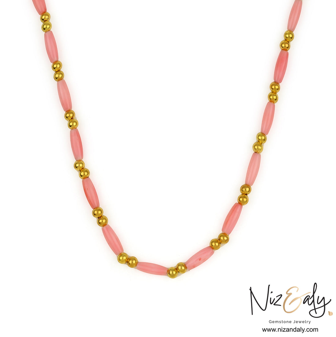 Niz & Aly dainty pink rice-shaped coral necklace with small gold beads on a white background