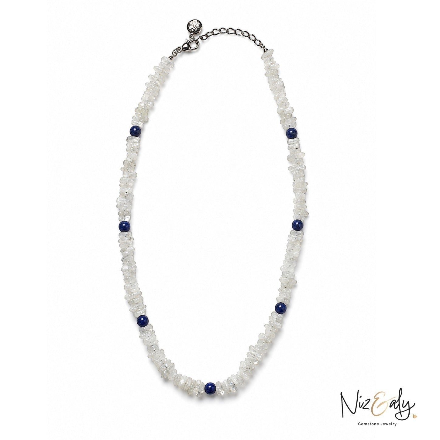 Niz & Aly minimalist necklace featuring clear quartz chip beads accented with small round blue lapis lazuli stones.