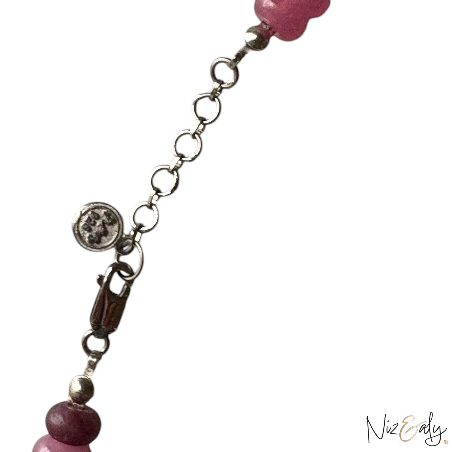 Niz & Aly necklace featuring a silver chain extender with a branded charm and smooth multicolored quartz beads.