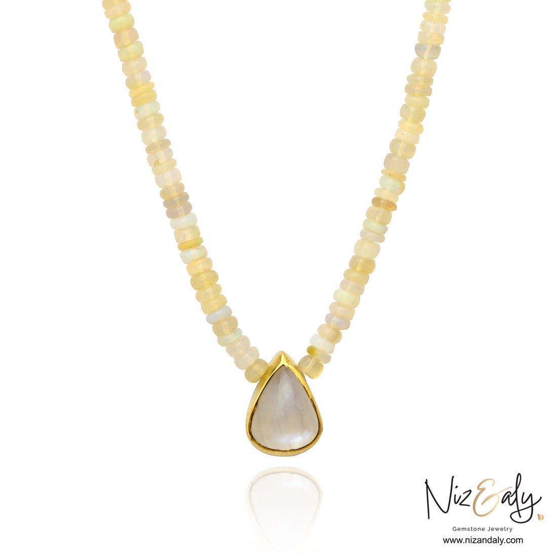 Niz & Aly handcrafted necklace featuring a teardrop Rainbow Moonstone pendant on a strand of shimmering Ethiopian Fire Opal