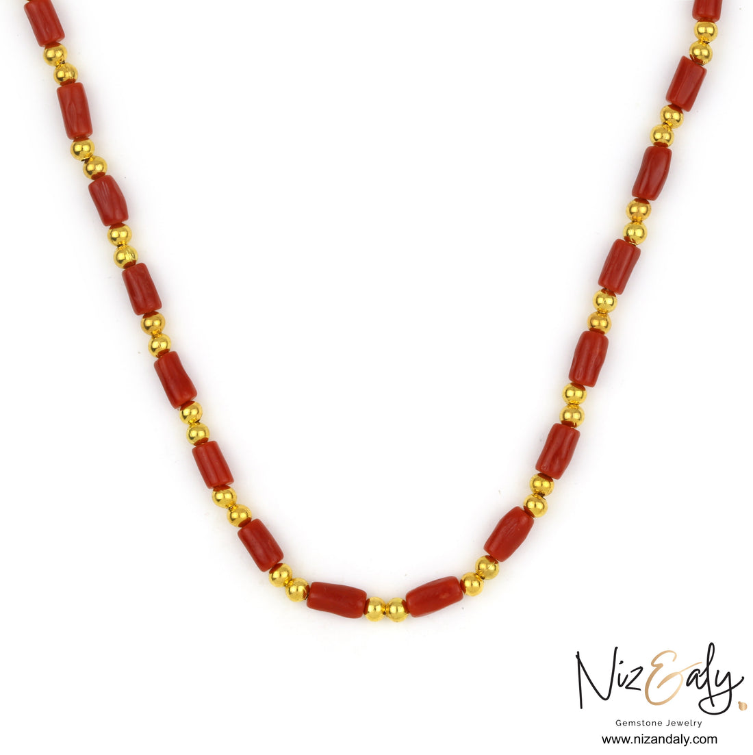Niz & Aly natural red coral barrel bead necklace with polished gold round spacers on a white background.