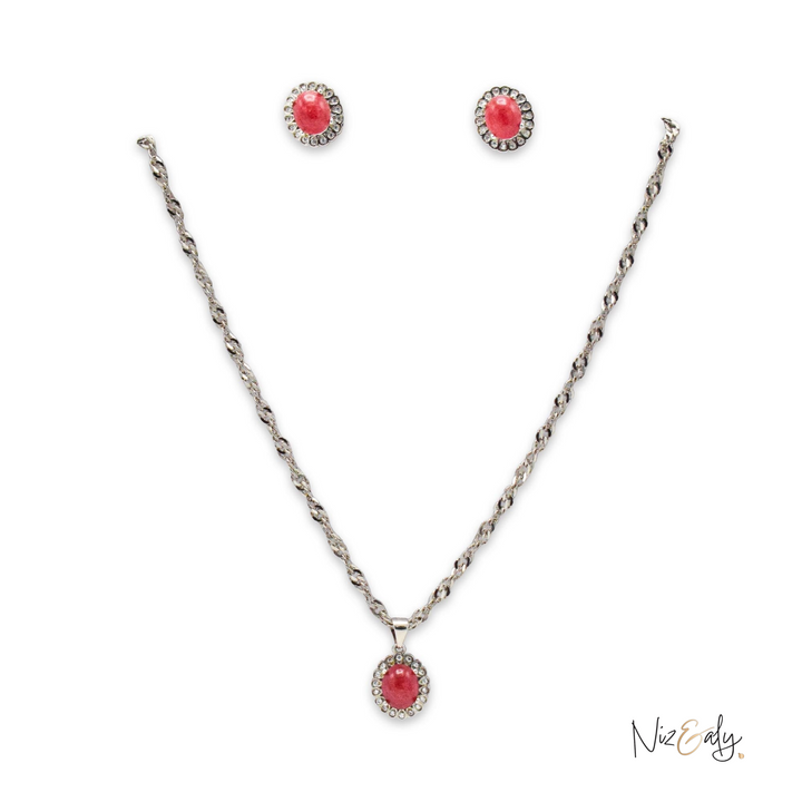 Niz & Aly red cabochon rubelite tourmaline locket and matching stud earrings set with crystal accents on silver chains