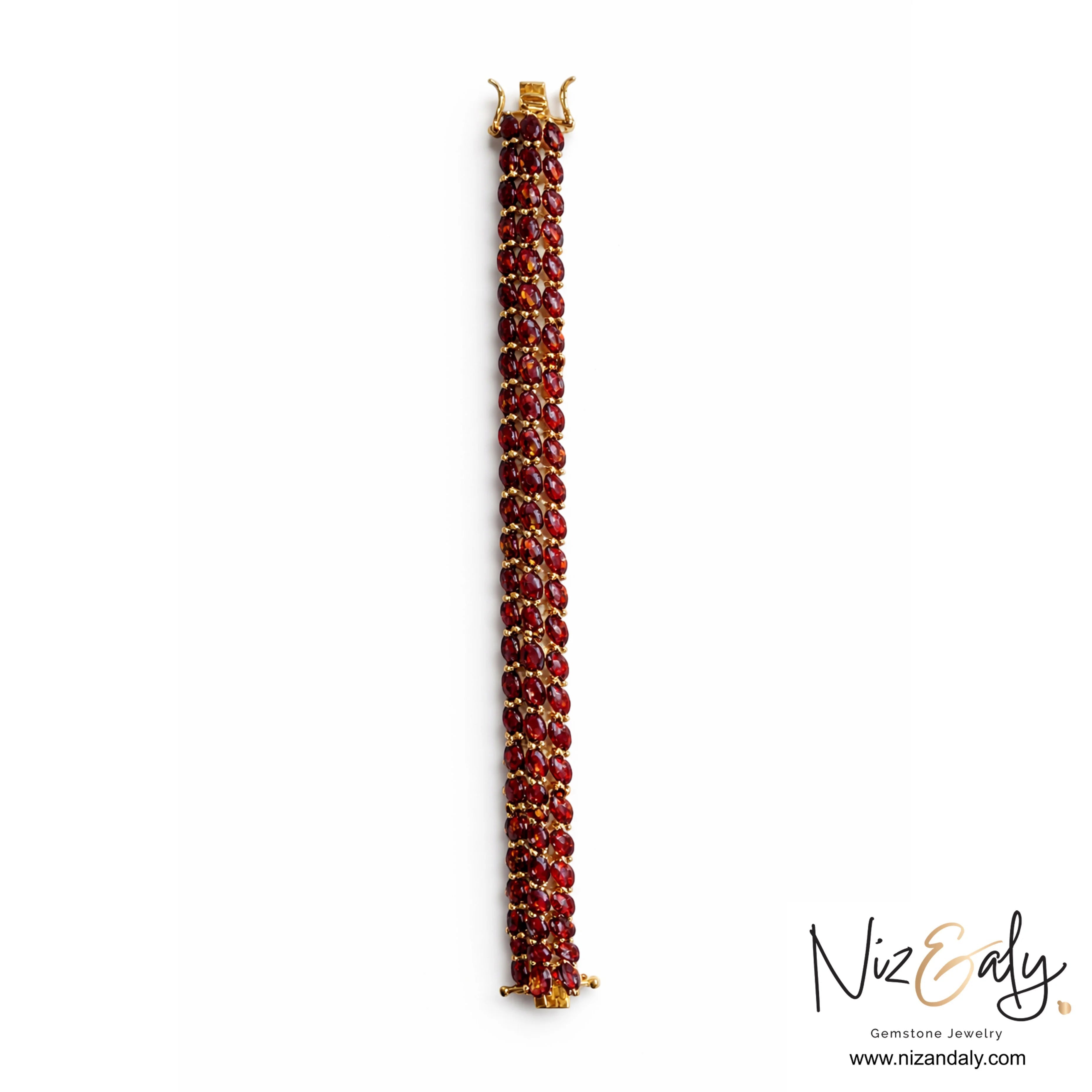 Niz & Aly multi-row bracelet featuring 93 marquise-cut rhodolite garnet stones set in 14K gold-plated sterling silver.