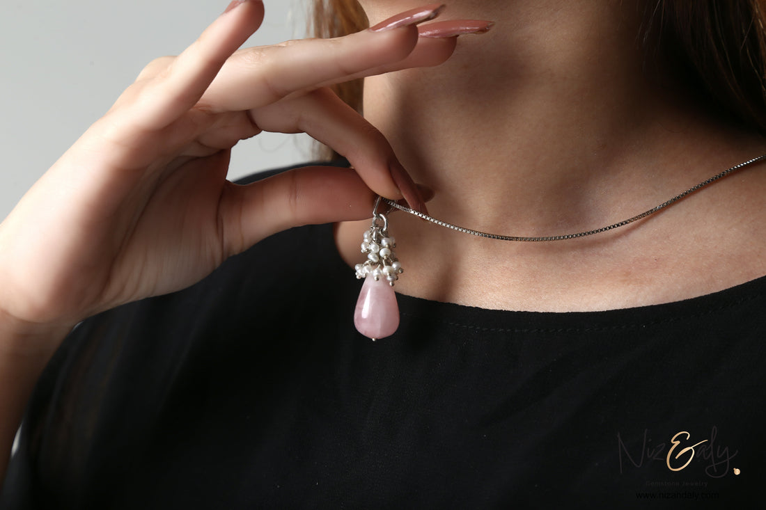 Niz & Aly dainty teardrop rose quartz pendant necklace with freshwater pearl accents worn on a silver chain