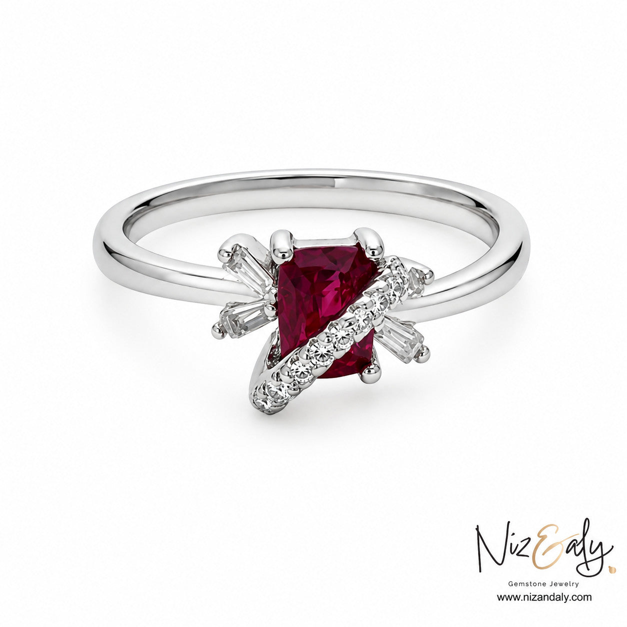 Niz & Aly ruby ring featuring a deep crimson cushion-cut ruby accented with baguette and round diamonds in silver