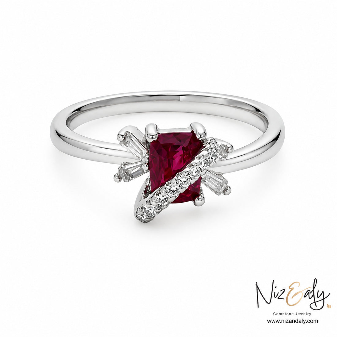 Niz & Aly ruby ring featuring a deep crimson cushion-cut ruby accented with baguette and round diamonds in silver