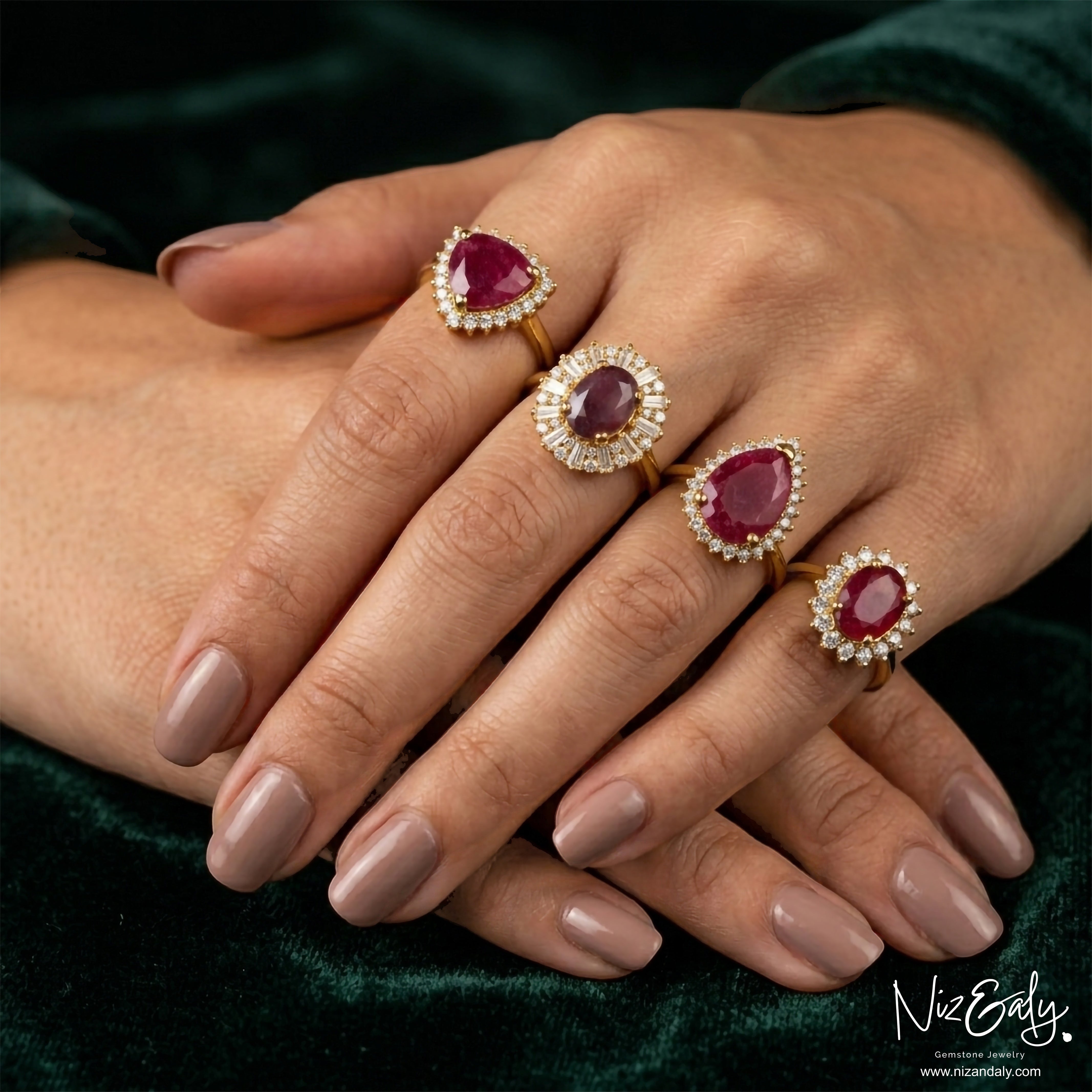 Niz & Aly ruby rings featuring various gemstone cuts with diamond halos on gold bands worn on a model's hands.