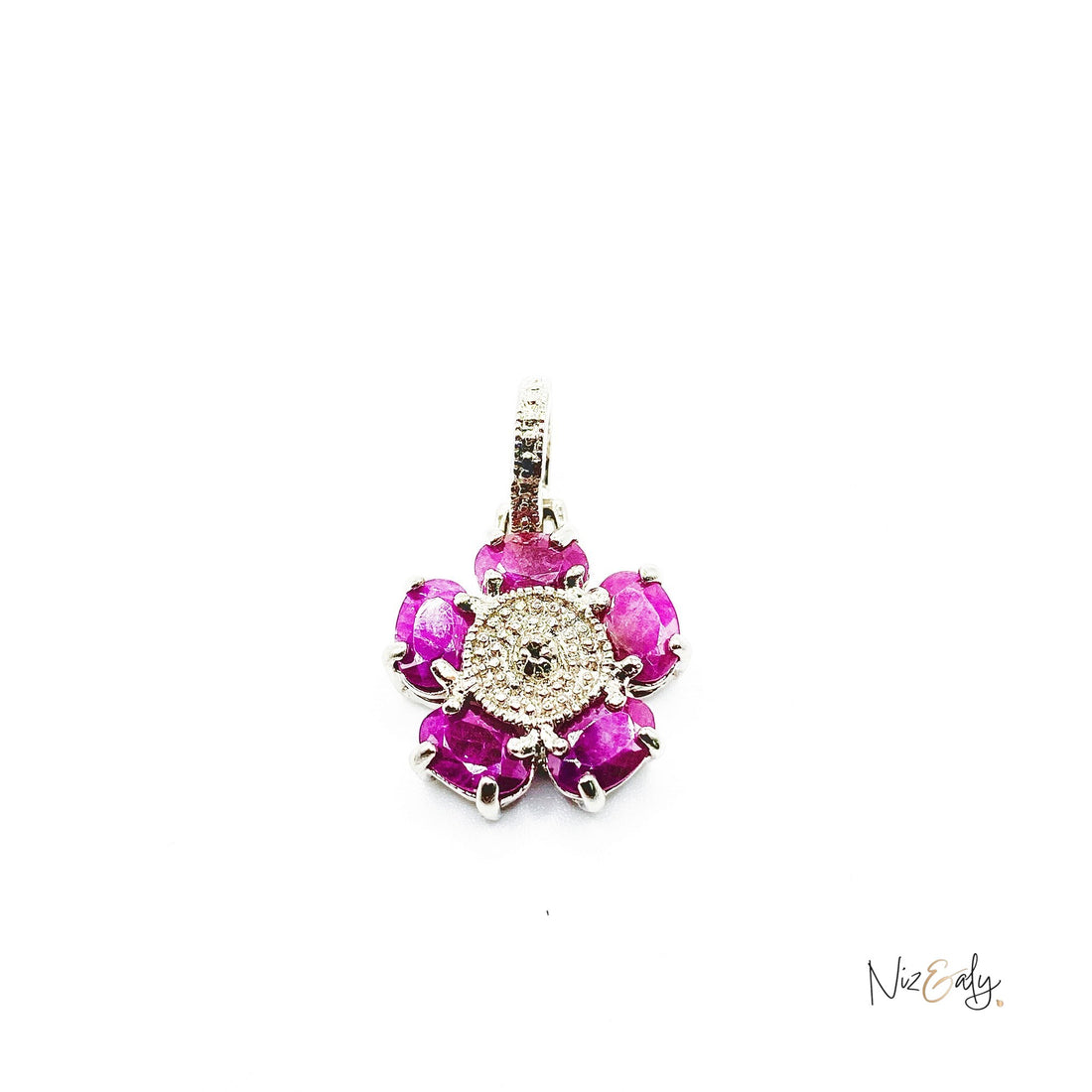 Niz & Aly flower pendant featuring five vibrant red rubies surrounding an intricate textured sterling silver center