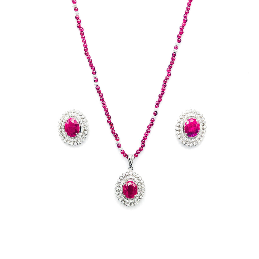 Niz & Aly African ruby pendant and earring set with a garnet bead necklace and diamond halo settings.