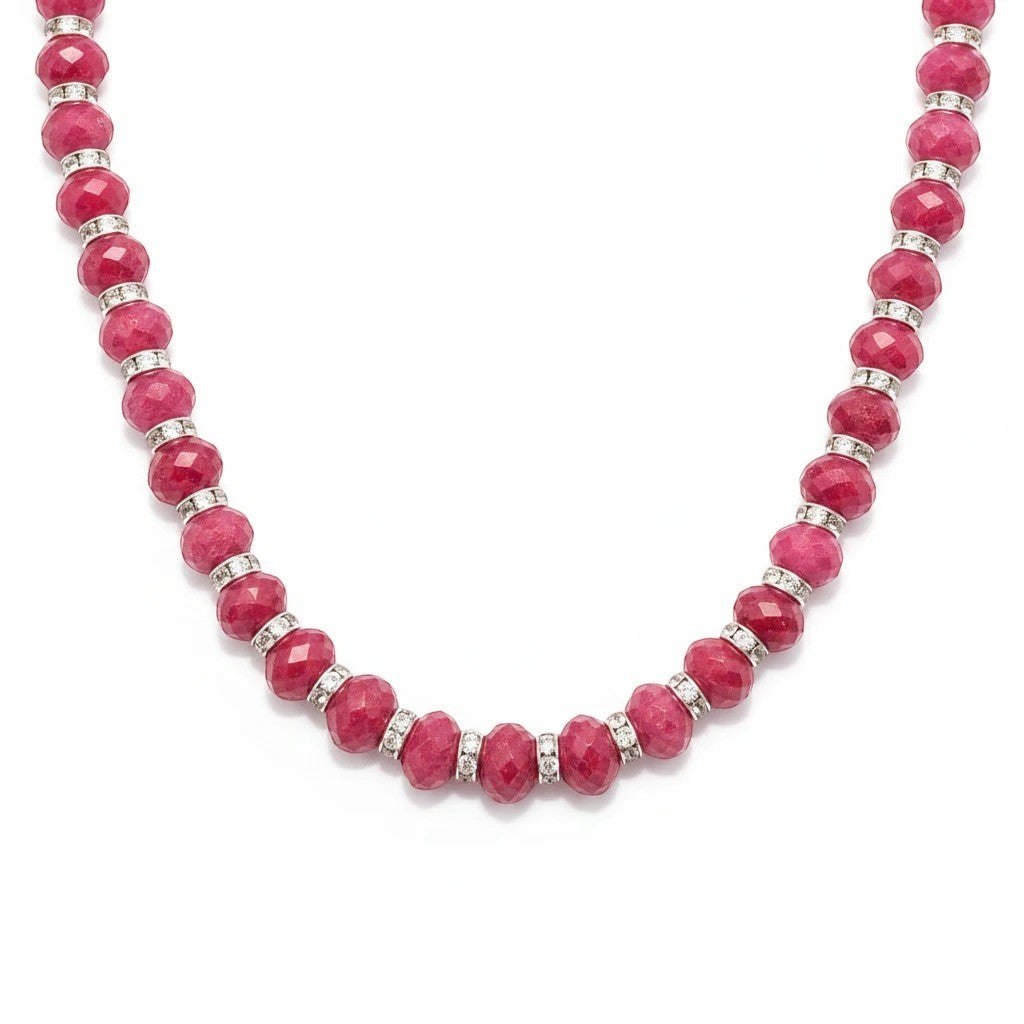 Niz & Aly ruby red faceted jade graduated necklace with silver-toned spacer beads on a white background