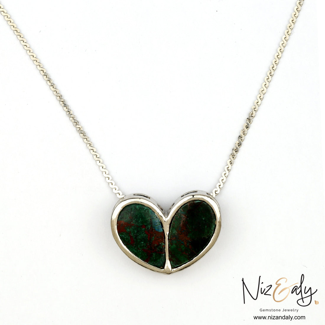 Niz & Aly heart-shaped ruby zoisite pendant necklace featuring green and red gemstone on a delicate silver chain.