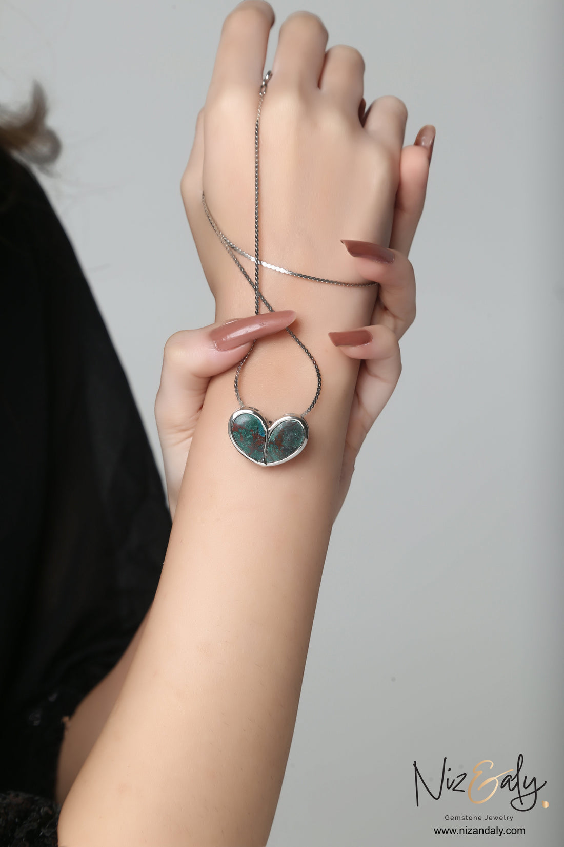 Niz & Aly heart-shaped ruby zoisite pendant necklace with green and red gemstone on a delicate silver chain