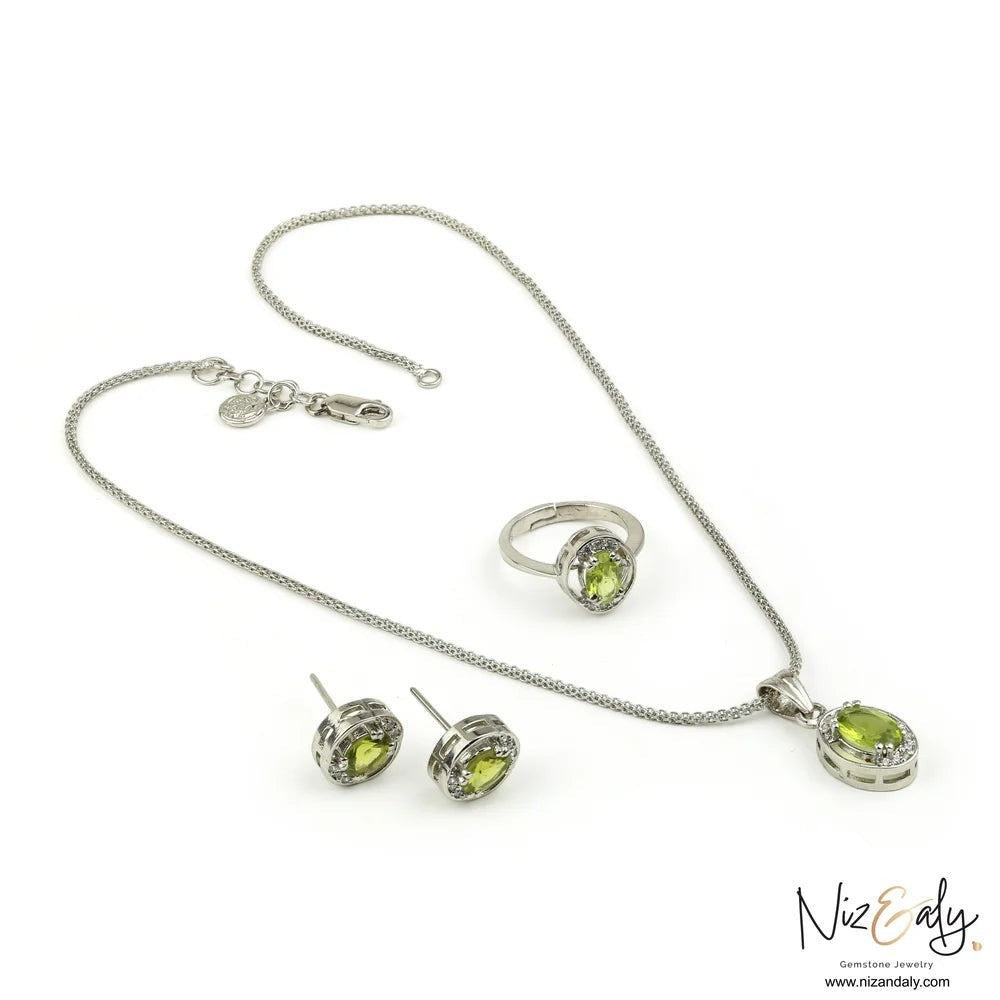 Niz & Aly Sage Dawn jewelry set featuring oval Arizona peridot stones in silver settings with delicate diamond halos.