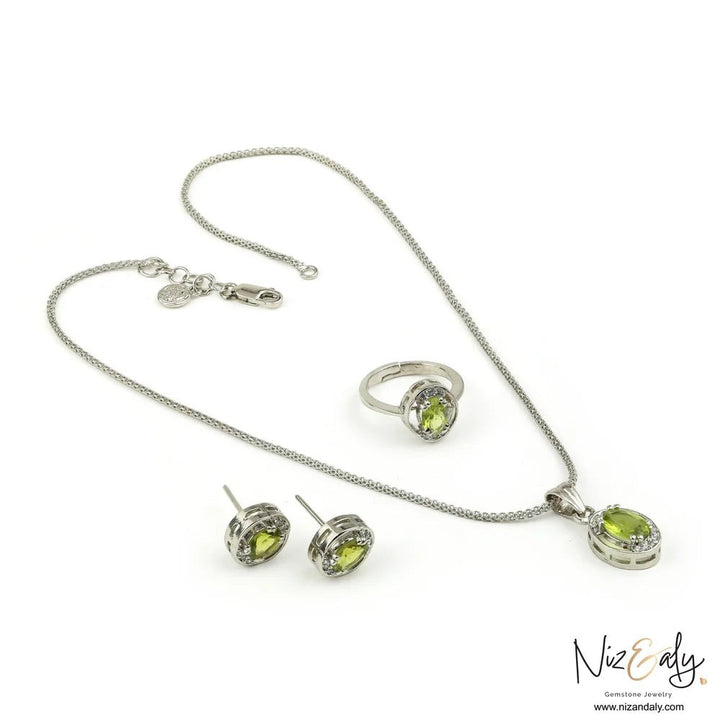 Niz & Aly Sage Dawn jewelry set featuring oval Arizona peridot stones in silver settings with delicate diamond halos.