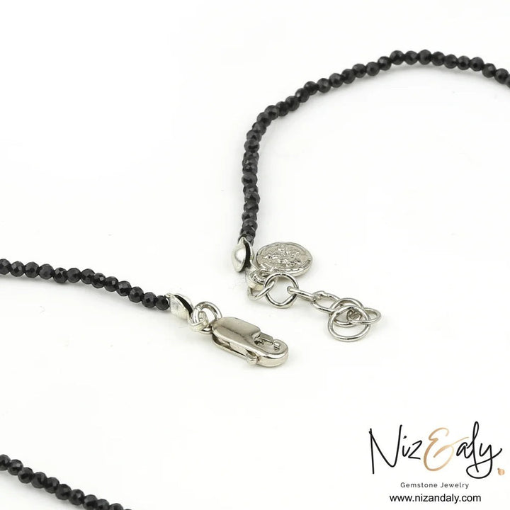 Niz & Aly dainty necklace featuring faceted black Shungite and Onyx beads with a 925 sterling silver lobster clasp.