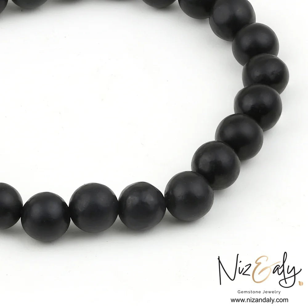 Niz & Aly genuine black Shungite stretch bracelet with a polished 925 sterling silver accent bead.