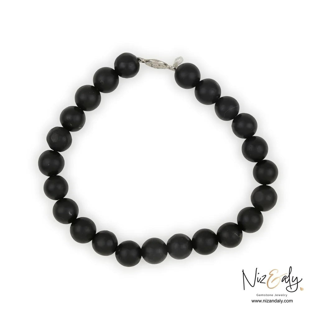 Niz & Aly genuine matte black Shungite stretch bracelet with a polished 925 sterling silver accent bead.
