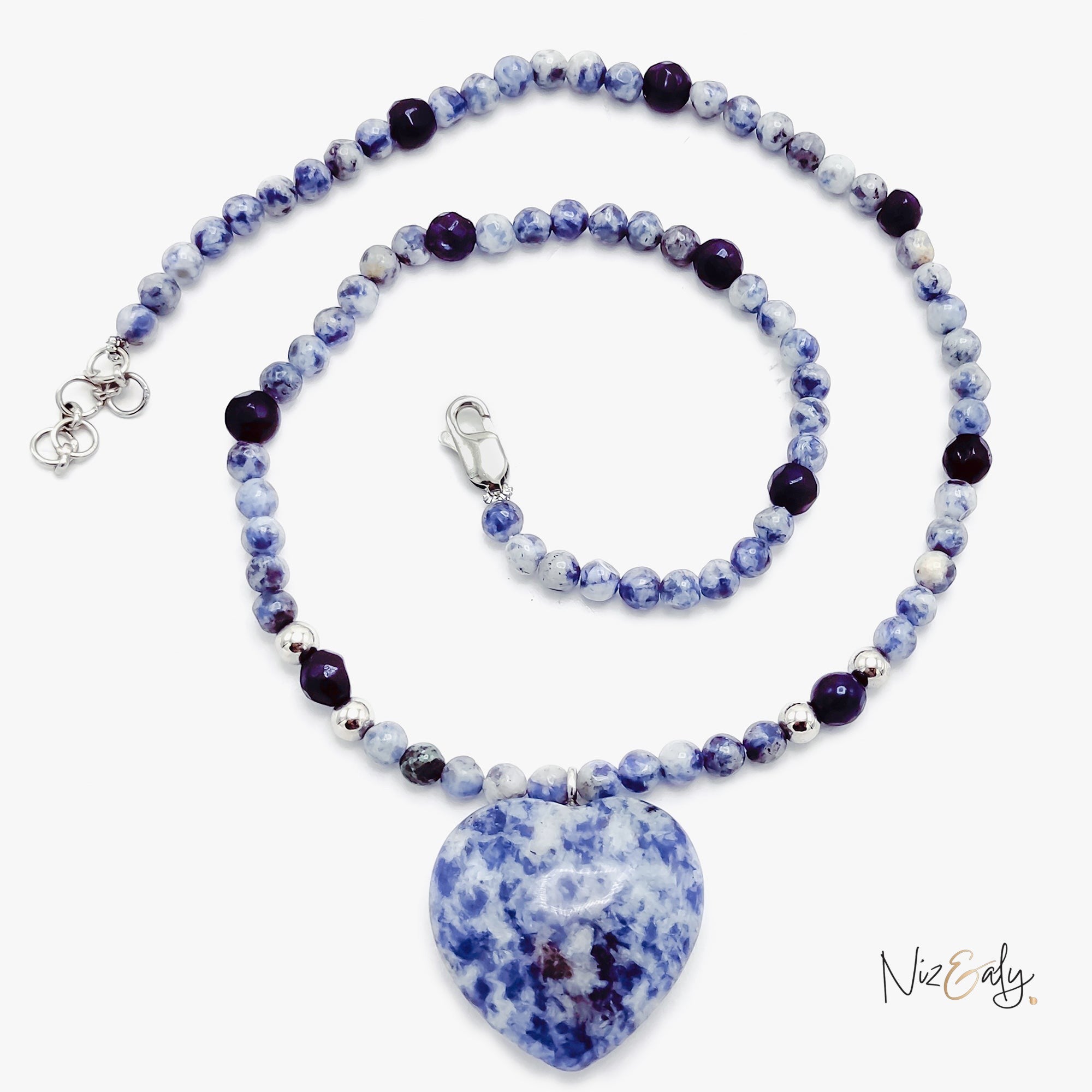 Niz & Aly sodalite heart pendant necklace featuring natural blue stone beads with polished royal blue gemstone accents.
