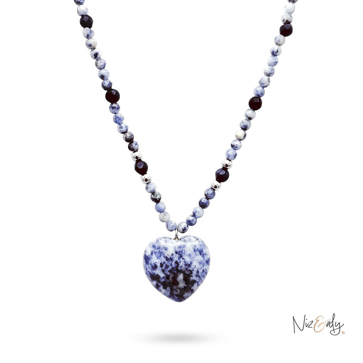 Niz & Aly sodalite heart pendant necklace with natural blue stone beads and silver accents on a white background.